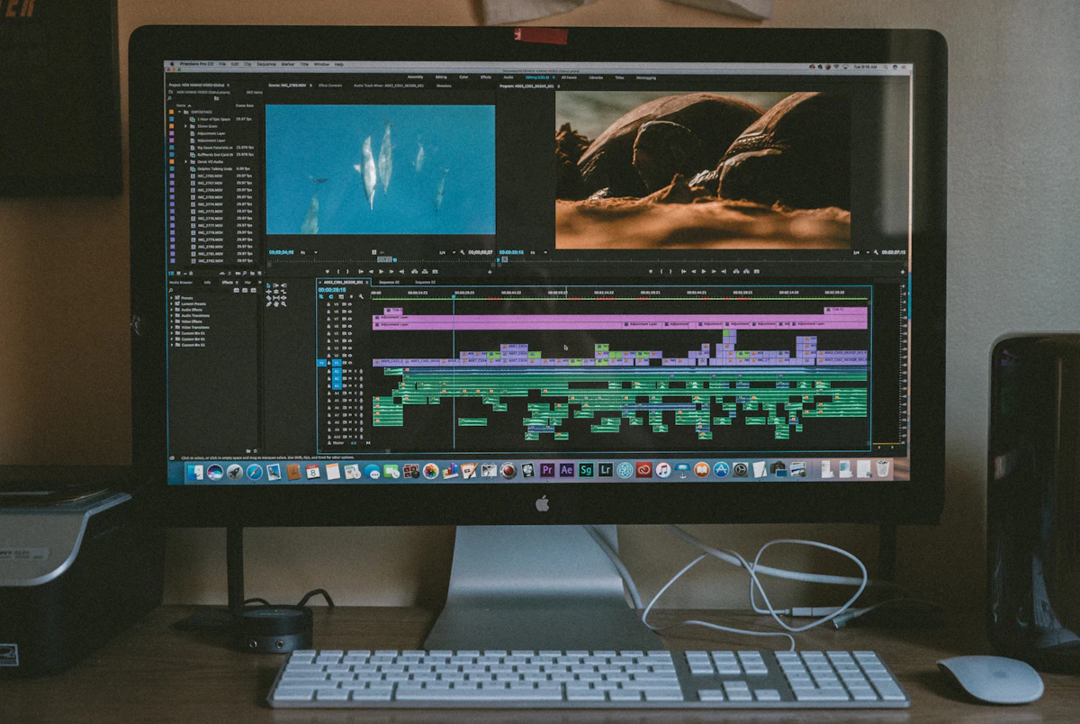 An editing desk with a monitor and keyboard